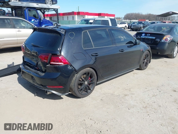 2021 Volkswagen Golf GTI S with VIN 3VW5T7AU6MM009986, listed as a IAAI auction lot 41744096 with 26,120 mi miles. Bid and sale history available at carsss.com. Image 4.