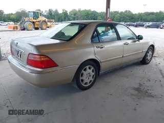 1999 Acura RL with VIN JH4KA9666XC008326, listed as a IAAI auction lot 42724647 with Not provided miles and . Bid and sale history available at DreamBid. Image 4.