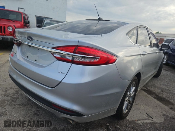 2017 Ford Fusion SE with VIN 3FA6P0H70HR394575, listed as a Copart auction lot 55752415 with 93,594 mi miles and Clean Title. Bid and sale history available at carsss.com. Image 4.