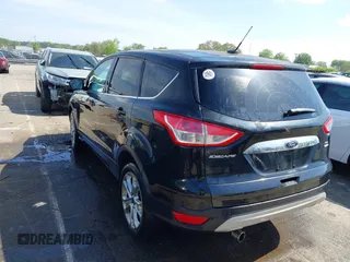 2013 Ford Escape SEL with VIN 1FMCU9H94DUA10002, listed as a IAAI auction lot 41963247 with 85,941 mi miles. Bid and sale history available at carsss.com. Image 3.