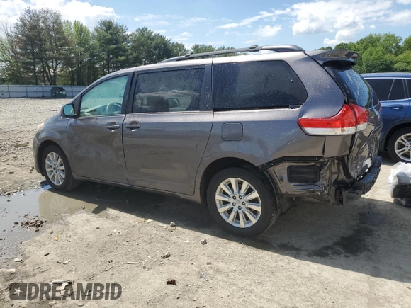 2014 Toyota Sienna Limited with VIN 5TDDK3DC5ES083477, listed as a Copart auction lot 56127375 with 131,560 mi miles and Salvage title. Bid and sale history available at DreamBid. Image 2.