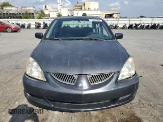 2004 Mitsubishi Lancer LS with VIN JA3AJ36E64U046788, listed as a Copart auction lot 71395384 with 222,288 mi miles and Salvage Title. Bid and sale history available at carsss.com. Image 5.
