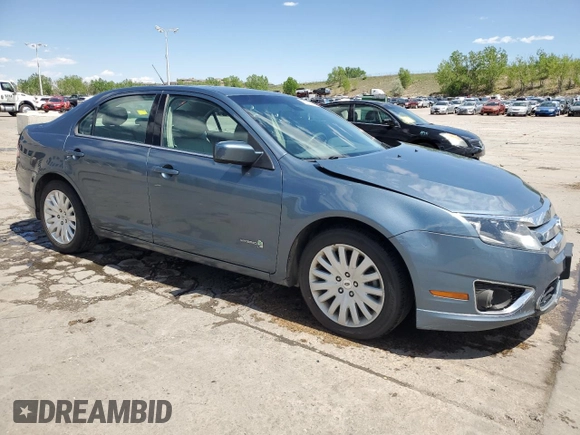 2012 Ford Fusion Hybrid z VIN 3FADP0L3XCR176552, wystawiony jako Copart lot #55787415 z przebiegiem 156 806 mil mil oraz Szkoda całkowita • Salvage title. Historia ofert i sprzedaży dostępna na DreamBid. Obrazek 4.