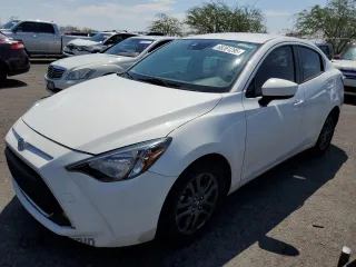 2019 Toyota Yaris L z VIN 3MYDLBYV0KY525865, wystawiony jako Copart lot #65261295 z przebiegiem 49 061 mil mil oraz Szkoda całkowita • Salvage title. Historia ofert i sprzedaży dostępna na DreamBid. Obrazek 1.