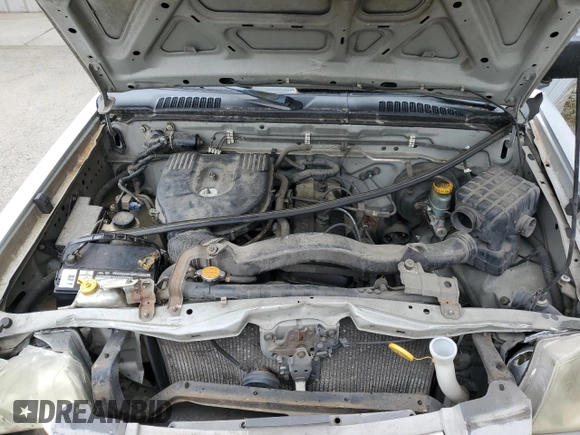 2002 Nissan Frontier z VIN 1N6DD26S02C360894, wystawiony jako Copart lot #54633205 z przebiegiem 239 440 mil mil oraz Szkoda całkowita • Salvage title. Historia ofert i sprzedaży dostępna na DreamBid. Obrazek 11.