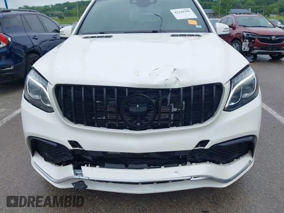 2018 Mercedes-Benz GLS 63 AMG with VIN 4JGDF7FE1JB099084, listed as a IAAI auction lot 42220385 with 97,904 mi miles and . Bid and sale history available at DreamBid. Image 6.