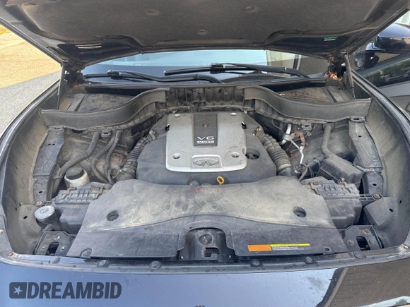 2014 Infiniti QX70 with VIN JN8CS1MW1EM411715, listed as a IAAI auction lot 42769793 with 180,472 mi miles and . Bid and sale history available at DreamBid. Image 10.