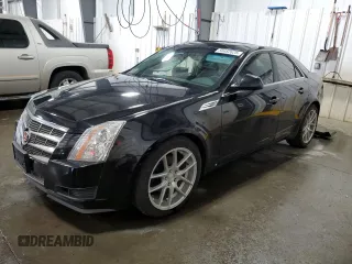 2009 Cadillac CTS AWD с VIN 1G6DH577290120201, выставлен на аукционе Copart как лот 56482625 с пробегом 128 631 миль миль и Списание • Salvage title. История ставок и продаж доступна на DreamBid. Изображение 1.