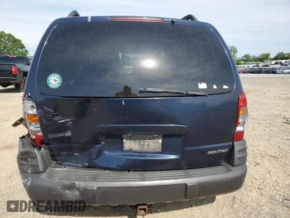 2004 Pontiac Montana z VIN 1GMDU03E94D196852, wystawiony jako Copart lot #57477115 z przebiegiem Nie podano mil oraz Nie do naprawy • Non repairable. Historia ofert i sprzedaży dostępna na DreamBid. Obrazek 6.