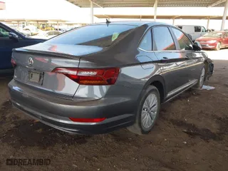 2019 Volkswagen Jetta S with VIN 3VWC57BU7KM084015, listed as a IAAI auction lot 41692630 with 98,002 mi miles. Bid and sale history available at carsss.com. Image 4.