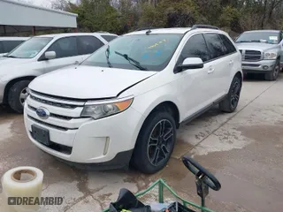 2013 Ford Edge SEL with VIN 2FMDK3JC6DBA21568, listed as a IAAI auction lot 41569717 with 173,159 mi miles. Bid and sale history available at carsss.com. Image 2.