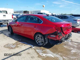 2021 Kia Forte EX with VIN 3KPF54AD1ME404443, listed as a IAAI auction lot 40952314 with 108,035 mi miles and . Bid and sale history available at DreamBid. Image 3.