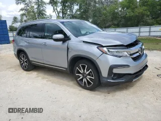 2021 Honda Pilot Touring 8-Passenger with VIN 5FNYF6H90MB079698, listed as a Copart auction lot 52011005 with 90,331 mi miles and Non repairable. Bid and sale history available at DreamBid. Image 4.