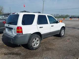 2005 Ford Escape XLT with VIN 1FMYU93145KD85599, listed as a IAAI auction lot 42036751 with 221,039 mi miles and . Bid and sale history available at DreamBid. Image 4.
