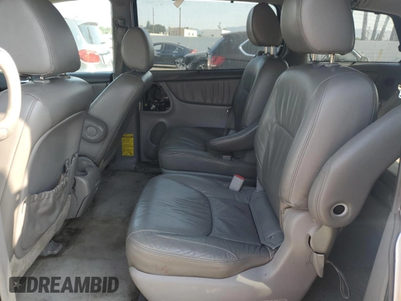 2010 Toyota Sienna XLE with VIN 5TDDK4CC8AS032007, listed as a Copart auction lot 65611495 with 299,904 mi miles and Salvage title. Bid and sale history available at DreamBid. Image 11.