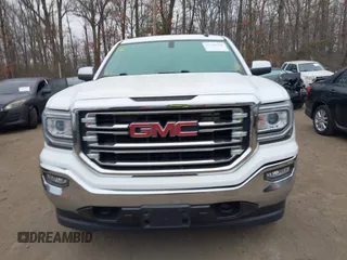 2018 GMC Sierra 1500 SLT z VIN 3GTU2NEC1JG402263, wystawiony jako IAAI lot #41786328 z przebiegiem 100 097 mil mil oraz . Historia ofert i sprzedaży dostępna na DreamBid. Obrazek 12.