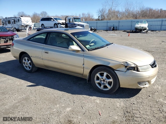 2000 Toyota Camry Solara SE with VIN 2T1CF28P0YC310353, listed as a Copart auction lot 48112195 with 128,128 mi miles and Clean Title. Bid and sale history available at carsss.com. Image 4.