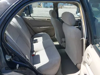 1999 Toyota Corolla VE z VIN 1NXBR12E9XZ205120, wystawiony jako IAAI lot #42216177 z przebiegiem 175 508 mil mil oraz . Historia ofert i sprzedaży dostępna na DreamBid. Obrazek 8.