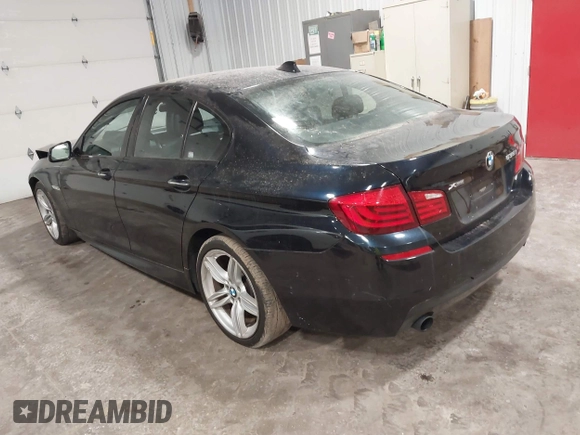 2013 BMW 5 Series 535i xDrive with VIN WBAFU7C5XDDU67162, listed as a IAAI auction lot 41741520 with 143,998 mi miles and . Bid and sale history available at carsss.com. Image 3.