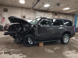 2015 Chevrolet Tahoe LT z VIN 1GNSKBKC1FR111299, wystawiony jako IAAI lot #41887115 z przebiegiem 157 666 mil mil oraz . Historia ofert i sprzedaży dostępna na DreamBid. Obrazek 15.