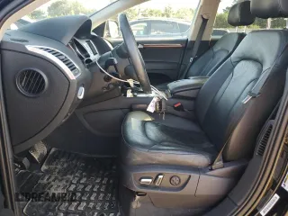 2014 Audi Q7 Premium Plus with VIN WA1LGAFE3ED002322, listed as a Copart auction lot 61565425 with 146,166 mi miles and Salvage title. Bid and sale history available at DreamBid. Image 7.