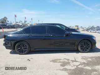 2022 BMW 7 Series 740i with VIN WBA7T2C07NCG88615, listed as a IAAI auction lot 39972481 with 76,169 mi miles. Bid and sale history available at carsss.com. Image 14.