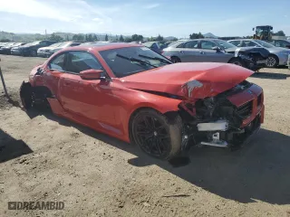 2024 BMW M2 with VIN 3MF13DM00R8D86349, listed as a Copart auction lot 51227764 with 7,114 mi miles and Salvage Title. Bid and sale history available at carsss.com. Image 4.