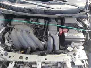 2012 Nissan Versa SV with VIN 3N1CN7AP7CL825501, listed as a Copart auction lot 63093735 with 129,227 mi miles and Salvage title. Bid and sale history available at DreamBid. Image 11.