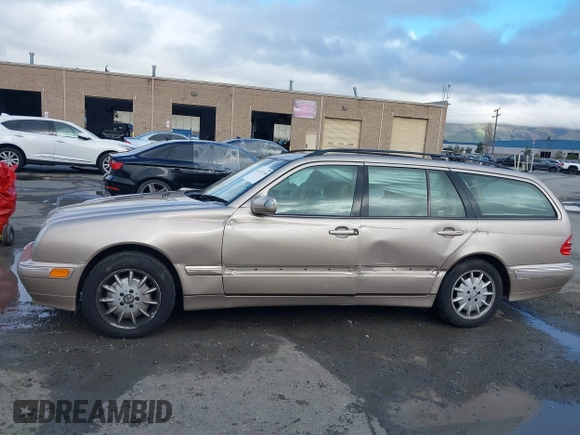 2001 Mercedes-Benz E-Class with VIN WDBJH65J41B349359, listed as a IAAI auction lot 41532318 with 96,375 mi miles. Bid and sale history available at carsss.com. Image 14.