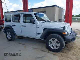 2021 Jeep Wrangler Unlimited Sport z VIN 1C4HJXDG7MW805657, wystawiony jako IAAI lot #42481446 z przebiegiem 24 299 mil mil oraz . Historia ofert i sprzedaży dostępna na DreamBid. Obrazek 13.