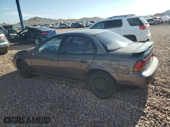 1999 Saturn SL with VIN 1G8ZK527XXZ136922, listed as a Copart auction lot 86704404 with 134,897 mi miles and Salvage Title. Bid and sale history available at carsss.com. Image 2.