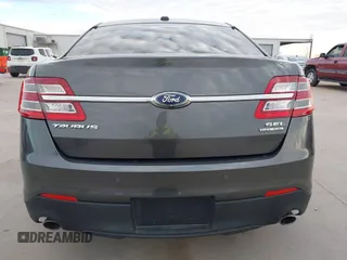 2017 Ford Taurus SEL z VIN 1FAHP2E80HG129843, wystawiony jako IAAI lot #41252910 z przebiegiem 111 923 mil mil oraz . Historia ofert i sprzedaży dostępna na DreamBid. Obrazek 16.