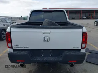 2023 Honda Ridgeline RTL with VIN 5FPYK3F55PB018188, listed as a IAAI auction lot 41952319 with 73,019 mi miles and . Bid and sale history available at DreamBid. Image 16.