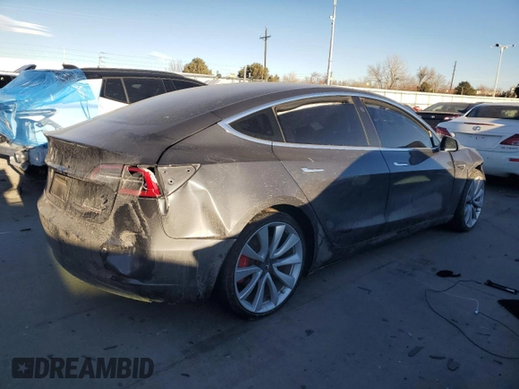 2019 Tesla Model 3 Long Range with VIN 5YJ3E1EB8KF477004, listed as a Copart auction lot 86192984 with 0 mi miles and Salvage Title. Bid and sale history available at carsss.com. Image 3.