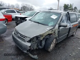 2010 Kia Sedona EX with VIN KNDMH4C33A6342127, listed as a IAAI auction lot 41570657 with 249,395 mi miles. Bid and sale history available at carsss.com. Image 17.