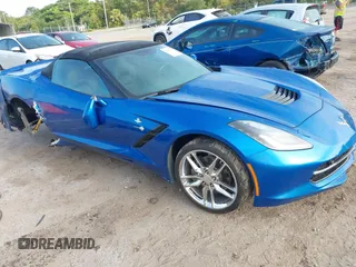 2016 Chevrolet Corvette 2LT z VIN 1G1YD3D79G5100331, wystawiony jako IAAI lot #42147777 z przebiegiem 72 420 mil mil oraz . Historia ofert i sprzedaży dostępna na DreamBid. Obrazek 1.