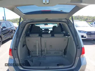 2010 Honda Odyssey EX with VIN 5FNRL3H44AB059711, listed as a IAAI auction lot 42057760 with 225,486 mi miles and . Bid and sale history available at DreamBid. Image 18.