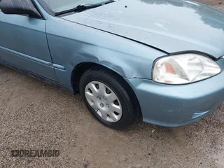 2000 Honda Civic VP z VIN 2HGEJ6612YH575604, wystawiony jako IAAI lot #42395535 z przebiegiem 164 185 mil mil oraz . Historia ofert i sprzedaży dostępna na DreamBid. Obrazek 17.