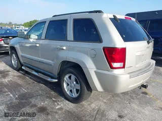 2007 Jeep Grand Cherokee Laredo with VIN 1J8GS48K77C545071, listed as a IAAI auction lot 41999998 with 144,966 mi miles. Bid and sale history available at carsss.com. Image 3.