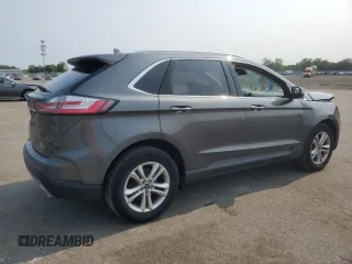 2019 Ford Edge SEL z VIN 2FMPK4J9XKBC67141, wystawiony jako Copart lot #60271615 z przebiegiem 100 400 mil mil oraz Szkoda całkowita • Salvage title. Historia ofert i sprzedaży dostępna na DreamBid. Obrazek 3.