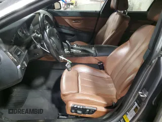 2013 BMW 6 Series 650i xDrive z VIN WBA6B4C56DD098658, wystawiony jako Copart lot #55408535 z przebiegiem 72 964 mil mil oraz Szkoda całkowita • Salvage title. Historia ofert i sprzedaży dostępna na DreamBid. Obrazek 7.