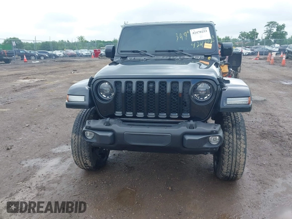 2023 Jeep Gladiator Overland with VIN 1C6JJTFM9PL593659, listed as a IAAI auction lot 42470253 with 34,374 mi miles and . Bid and sale history available at DreamBid. Image 18.