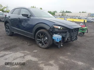 2025 Mazda CX-30 S Select Sport z VIN 3MVDMBBM8SM808189, wystawiony jako IAAI lot #42183591 z przebiegiem 2 058 mil mil oraz . Historia ofert i sprzedaży dostępna na DreamBid. Obrazek 1.