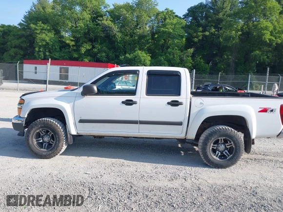 2007 Chevrolet Colorado 1LT z VIN 1GCDT13E978249656, wystawiony jako IAAI lot #42445862 z przebiegiem 115 298 mil mil oraz . Historia ofert i sprzedaży dostępna na DreamBid. Obrazek 14.