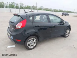 2016 Ford Fiesta SE with VIN 3FADP4EJ3GM203760, listed as a IAAI auction lot 41928386 with 52,744 mi miles. Bid and sale history available at carsss.com. Image 4.