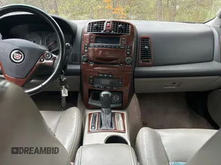 2004 Cadillac CTS with VIN 1G6DM577940109765, listed as a Copart auction lot 79450024 with 221,648 mi miles and Clean Title. Bid and sale history available at carsss.com. Image 9.