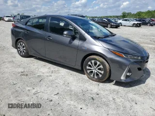 2021 Toyota Prius LE with VIN JTDKAMFP6M3190117, listed as a Copart auction lot 52938355 with 39,569 mi miles and Salvage title. Bid and sale history available at DreamBid. Image 4.