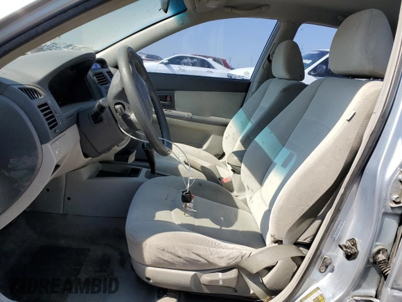 2006 Kia Spectra EX with VIN KNAFE121865277527, listed as a Copart auction lot 74613214 with 123,368 mi miles and Salvage Title. Bid and sale history available at carsss.com. Image 7.