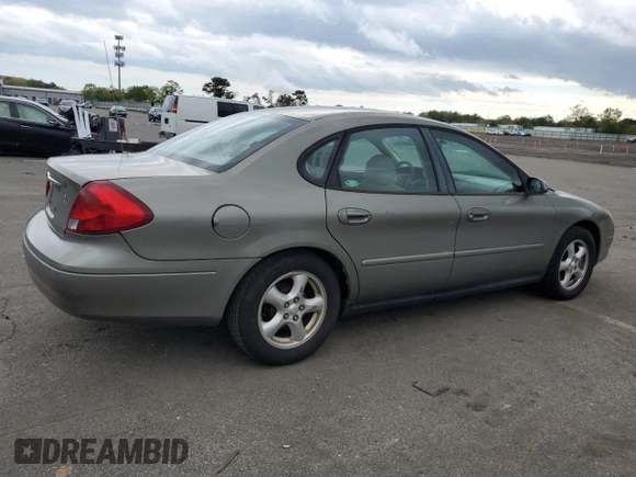 2002 Ford Taurus SE Standard z VIN 1FAFP53U92A246842, wystawiony jako Copart lot #57858765 z przebiegiem 64 545 mil mil oraz Czysty tytuł • Clean title. Historia ofert i sprzedaży dostępna na DreamBid. Obrazek 3.