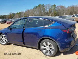 2023 Tesla Model Y Long Range with VIN 7SAYGDEE6PF847890, listed as a IAAI auction lot 41635687 with 32,846 mi miles and . Bid and sale history available at DreamBid. Image 15.